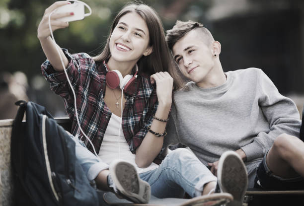 istock Teenagers taking selfie with smartphone 647662648