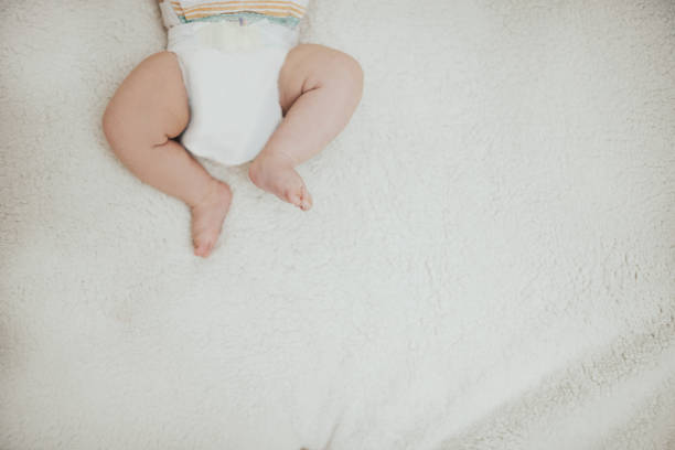 istock Baby wearing diapers 647668628