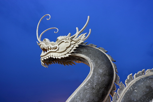 The beautifully detailed golden dancing dragon built in Suan Sawan, or Paradise Park in Nakhon Sawan, Thailand