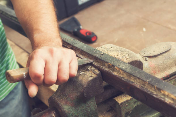 istock Carpenter working on the raw board / wood. 647669686