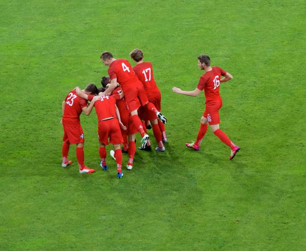 istock Football players celebrating 647672084