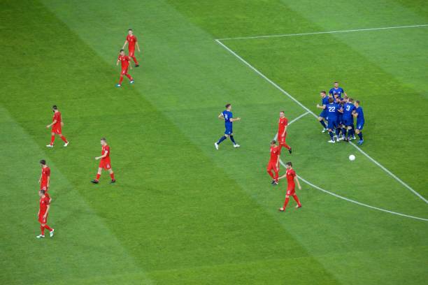 istock Soccer players celebrating 647672098