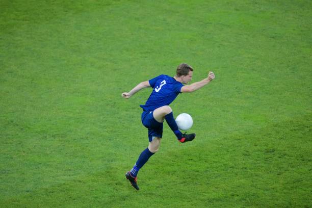 istock Football player stopping 647672166