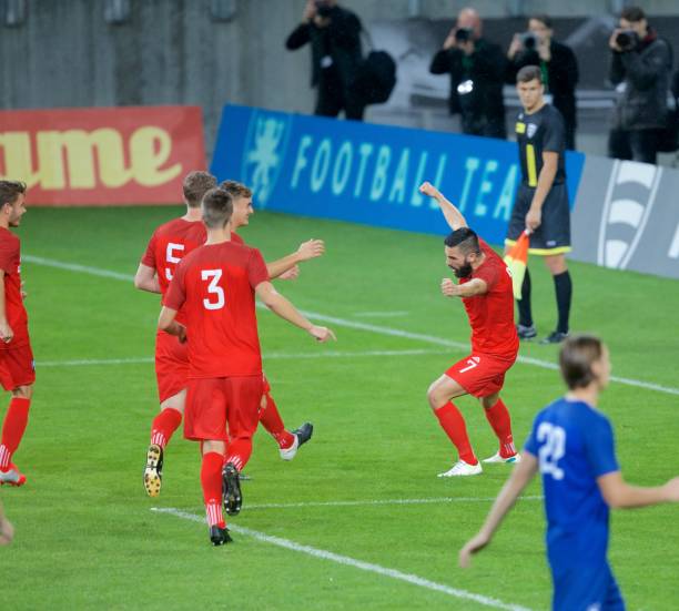 istock Football players celebrating 647672222