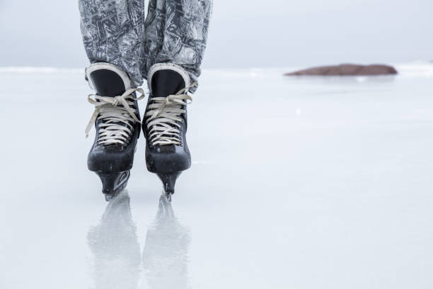 istock Man skating and training with black skatess. Weekends activities outdoor. 647672332