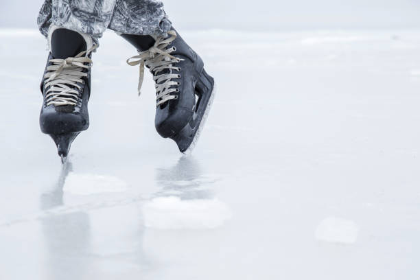 istock Man skating and training with black skatess. Weekends activities outdoor. 647672622