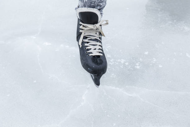 istock Man skating and training with black skatess. Weekends activities outdoor. 647672880
