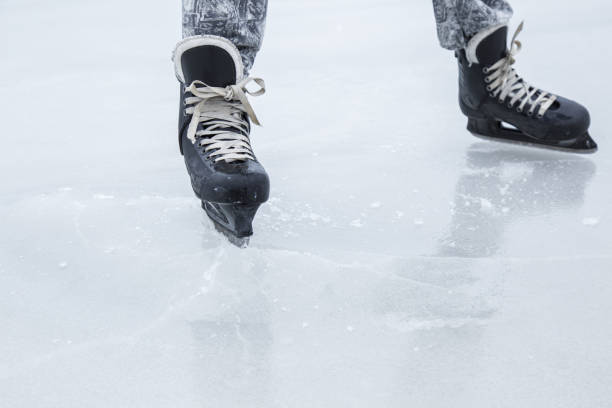 istock Man skating and training with black skatess. Weekends activities outdoor. 647675530