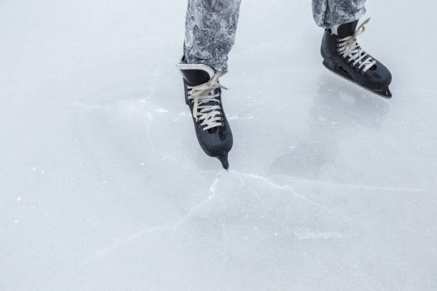 istock Man skating and training with black skatess. Weekends activities outdoor. 647675658