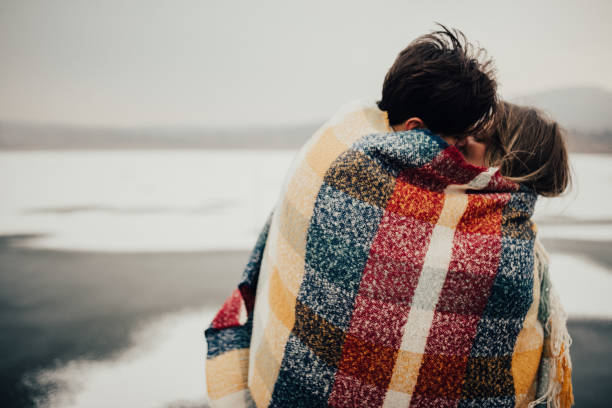 istock Blanket and warmth of their love keeps them from getting cold 647676150