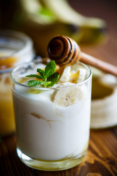 fresh homemade yogurt with bananas and honey for breakfast