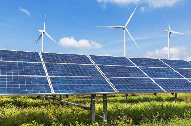 istock solar panels and wind turbines in power station 647676978
