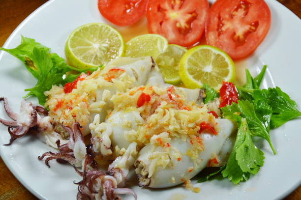 istock steamed squid stuffed minced pork dressing spicy lemon sauce 647688204