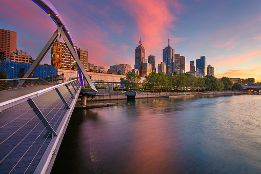 Cityscape image of Melbourne, Australia during summer sunrise.