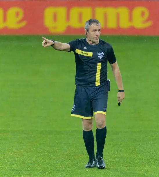 Referee pointing out during a match.