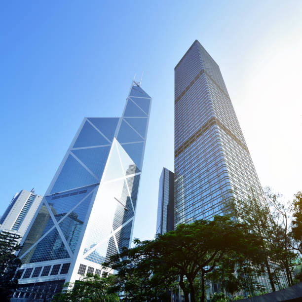 Hong Kong's Central District Skyscrapers Hong Kong's central district skyscrapers in the blue sky, Hong Kong. the bank of china tower stock pictures, royalty-free photos & images