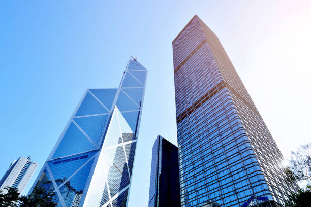 Hong Kong's Central District Skyscrapers Hong Kong's central district skyscrapers in the blue sky, Hong Kong. the bank of china tower stock pictures, royalty-free photos & images