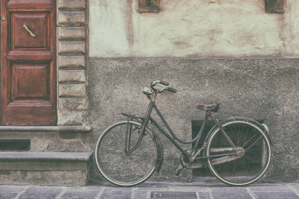 istock Old Bicycle near the wall 647711626