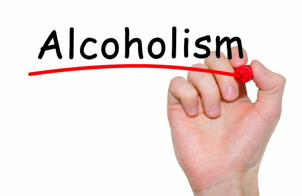 istock Hand writing inscription Alcoholism with marker, concept 647717836