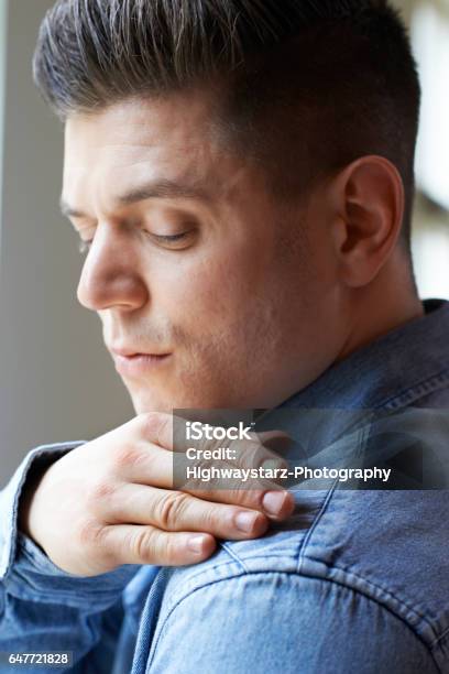 Man Brushing Dandruff From Shoulders Stock Photo - Download Image Now - Men, Only Men, Psoriasis