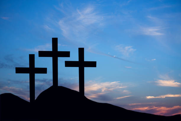 istock Easter, Crucifixion scene with three cross on a hill. 647731488