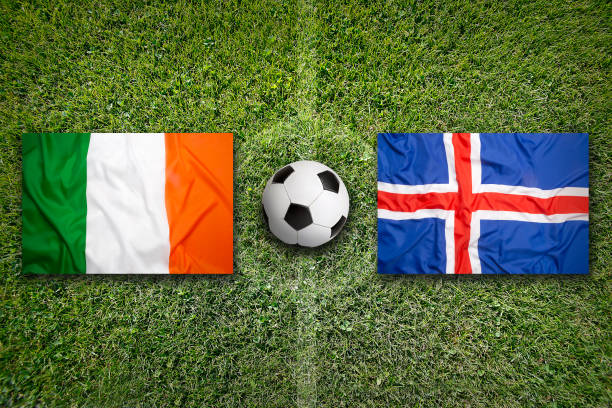istock Ireland vs. Iceland flags on soccer field 647732034
