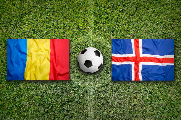 istock Romania vs. Iceland flags on soccer field 647732208