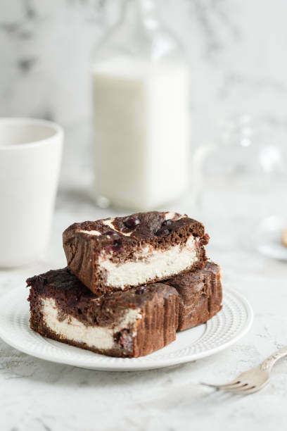 istock Dessert brownie-cheesecake with berries 647739216