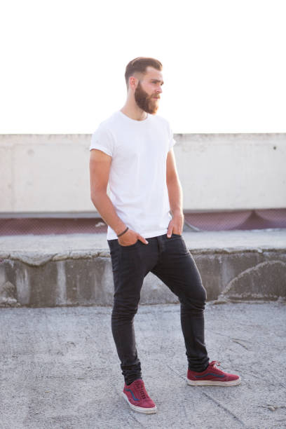 istock Bearded man posing in the street. 647739274