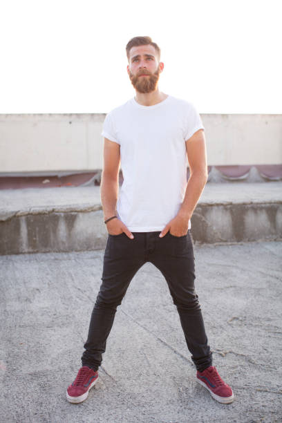 istock Bearded man posing in the street. 647739304