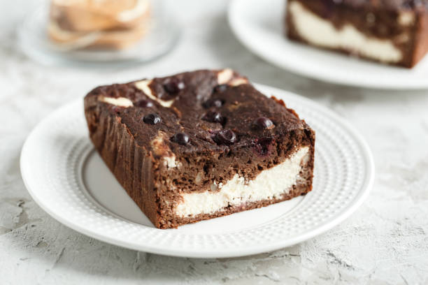 istock Dessert brownie-cheesecake with berries 647740136