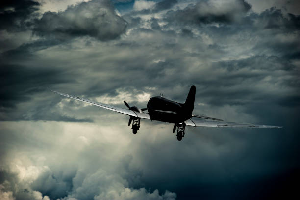 istock Airplane is flying into the storm. 647746016
