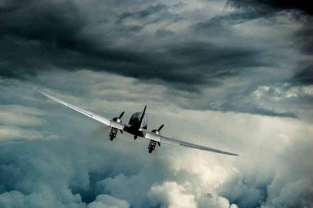 istock Airplane is flying into the storm. 647746026