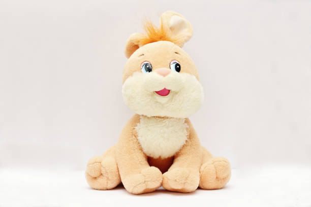 Soft children's toy rabbit fluffy fun isolated white background.
