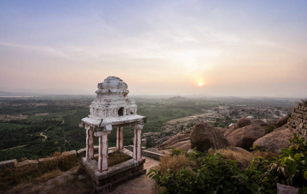 Sunset from Matanga parvata (hills) in Hampi. Sunset from Matanga parvata (hills) in Hampi. Hampi temple city seen in the picture. karnataka, india. virupaksha stock pictures, royalty-free photos & images