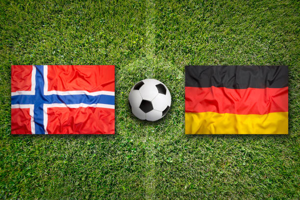istock Norway vs. Germany flags on soccer field 647759696