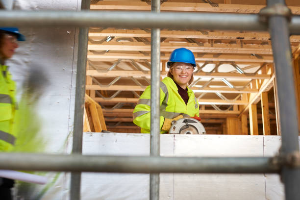 istock happy female site carpenter 647763344