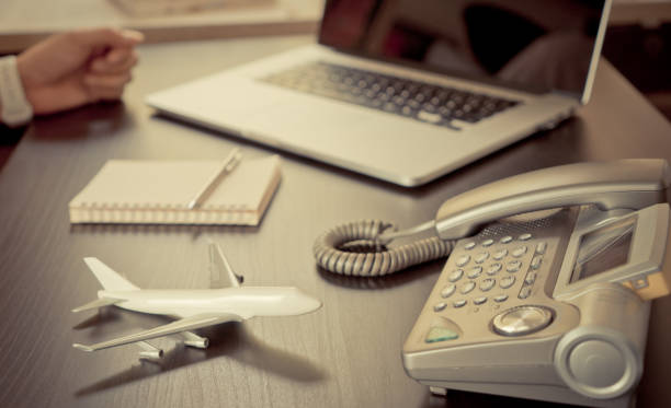 istock Travel Agency is working on his office desk 647770300