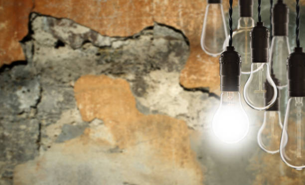 istock Idea and leadership concept - bulbs on the grunge background 647776632