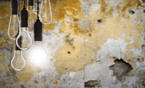 istock Idea and leadership concept - bulbs on the grunge background 647777168