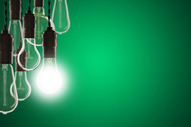 istock Idea and leadership concept - bulbs on the grunge background 647780016
