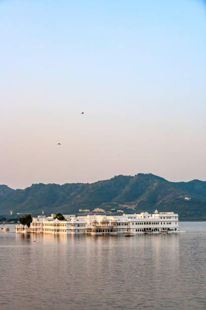 lake Palace, Udaipur Rajasthan in early morning light The Lake Palace, Udaipur Rajasthan in early morning light lake palace stock pictures, royalty-free photos & images