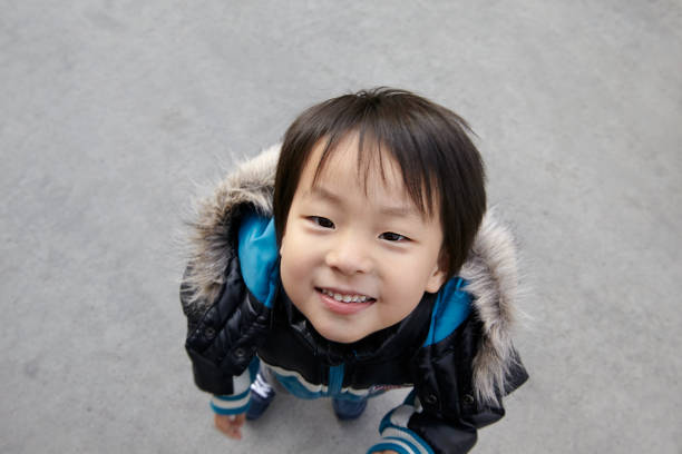 Young children smiling Japanese man