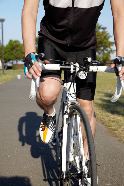 Japanese man cycling in the Park