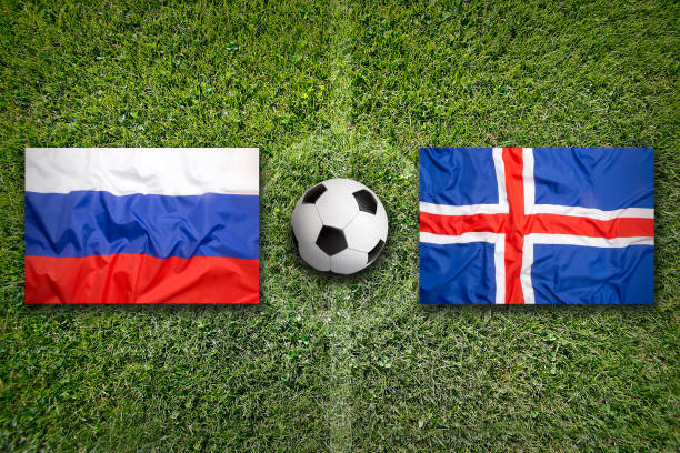 istock Russia vs. Iceland flags on soccer field 647793662