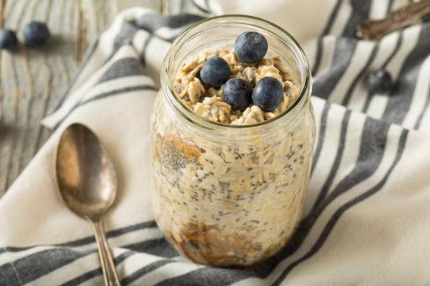 healthy homemade overnight oats oatmeal - oat imagens e fotografias de stock