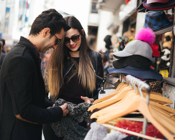 istock Happy young couple shopping 647795052