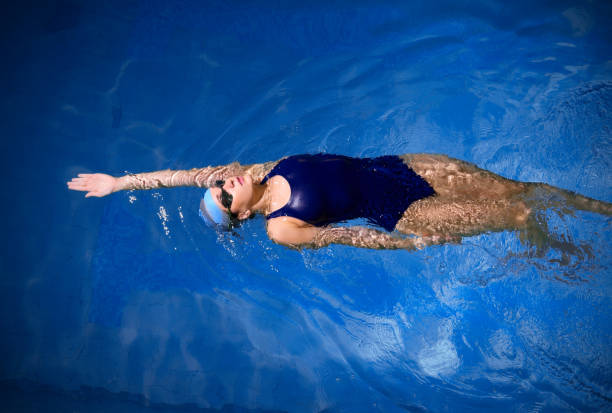 istock Young woman swimmer 647798316