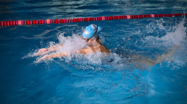 istock Young woman swimmer 647798362