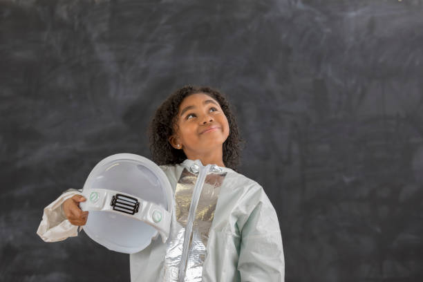 istock Adorable young astronaut at school 647798836